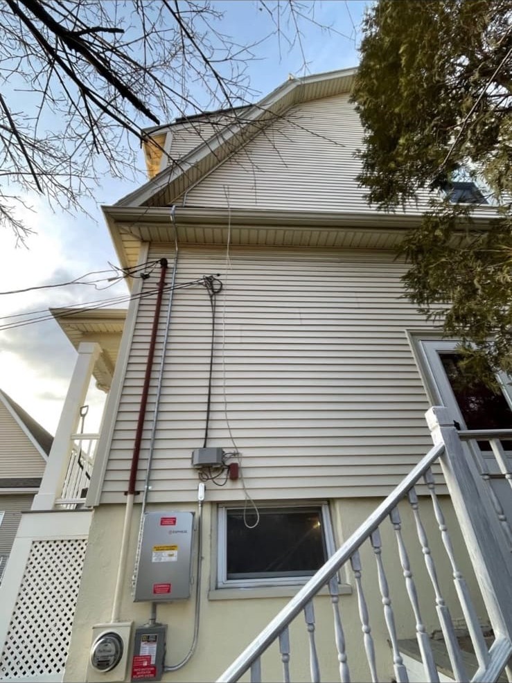 Enphase solar PV system maintenance on a South Shore home